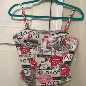 This crop top newsletter shirt is perfect for a outing with your girls.